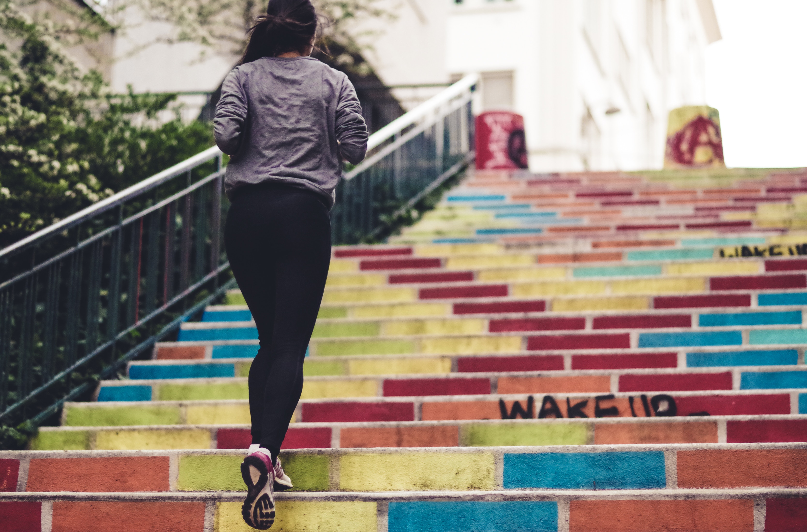 A woman running alone outdoors